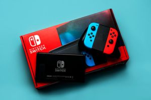 Nintendo Switch OLED rood/blauw